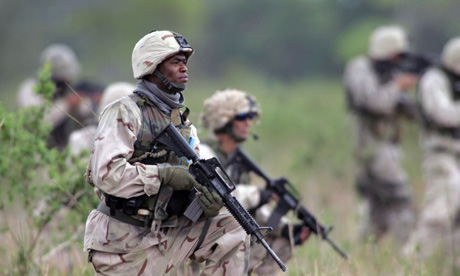 Generation Kill: from left, Alexander Skarsgård	as Sgt Brad 'Iceman' Colbert; Jon Huertas as Sgt. Antonio 'Poke' Espera; and James Ransone as Cpl. Josh Ray Perso