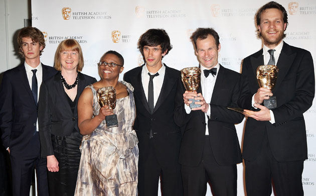 Bafta TV awards 2009: Andrew Garfield (left) with the cast and crew of Criminal Justice