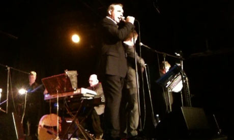 Broadcaster Nicky Campbell performing with a swing band