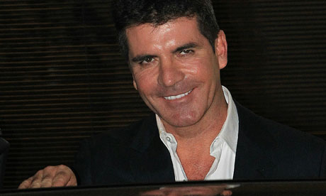 simon cowell wife 2010. simon cowell trousers.