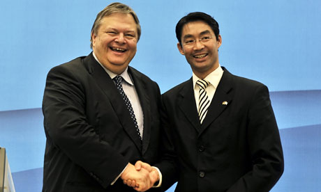 Evangelos Venizelos shaking hands with Philipp Rösler