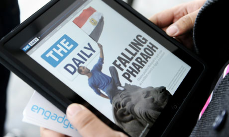 A journalist views the Daily on an iPad