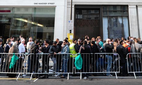 People queue outside the Apple store on Regent Street on 25 March