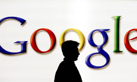 Man Passing Google Logo at Frankfurt Book Fair