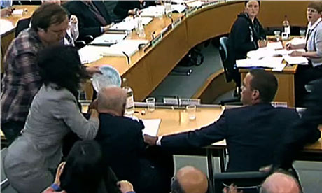 Rupert Murdoch is attacked with a foam pie