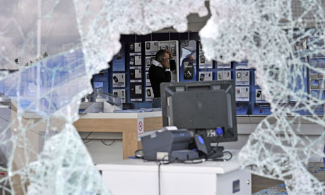 London riots: a looted O2 mobile phone store in Tottenham Hale retail park.