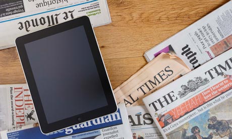 ipad and newspapers