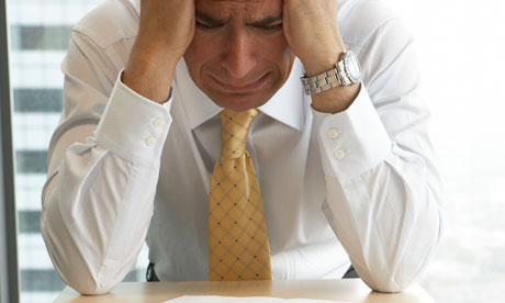 Businessman at desk in office