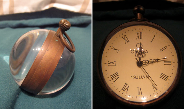 Antiques 230412: An Omega ball-shaped desk clock