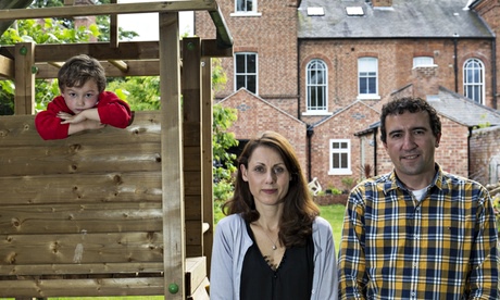 Kate, Alex and Isaac Jerfferson in their garden