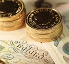 Pound coins and notes money