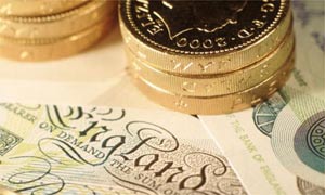 Pound coins and notes money