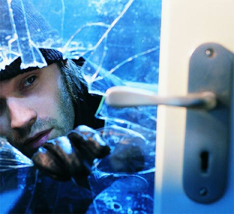 Burglar commiting a robbery