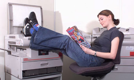 Office worker with her feet up