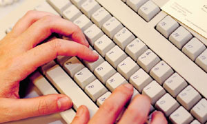 Hands on computer keyboard