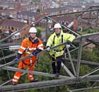 Overhead linesman on a pylon