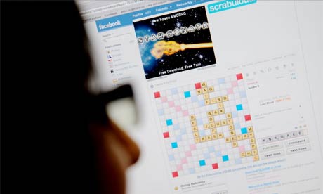 A worker playing Scrabulous on their computer