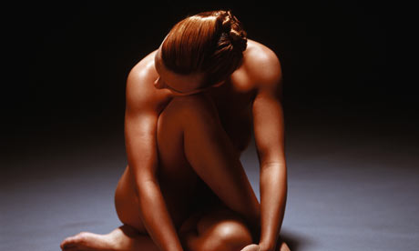 A naked model curled up Photograph Public Domain