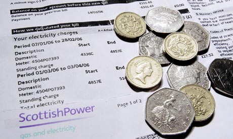 A ScottishPower electricity bill with coins
