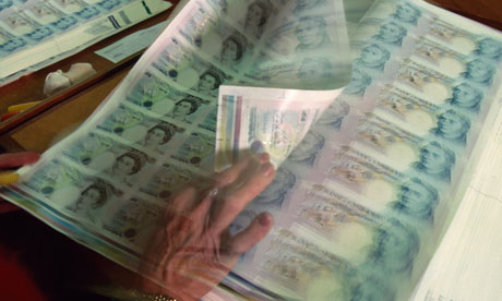 A sheet of freshly printed money