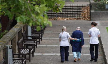 An elderly patient outside a hospital