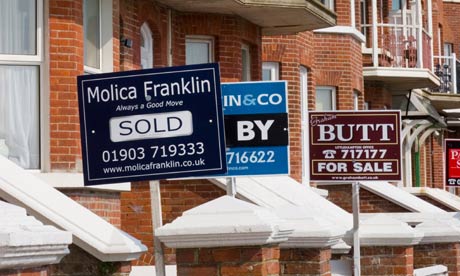 Estate agents for sale and sold signs