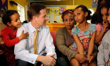 Nick Clegg with a mother and her child
