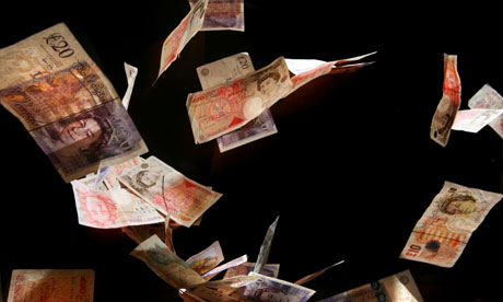 Bank notes falling through the air