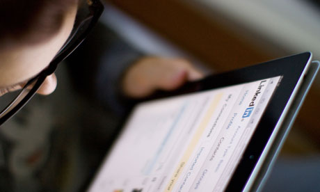 Someone using LinkedIn on an iPad