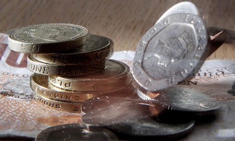 Coins and a £10 note