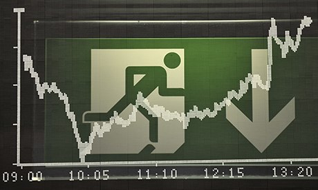 The DAX share price index seen in front of an emergency exit sign
