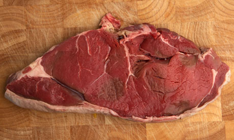 A raw slice of chump steak from organic longhorn Irish cows