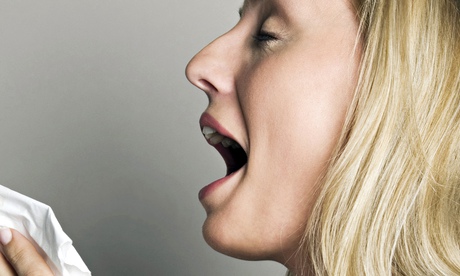 Woman Sneezing