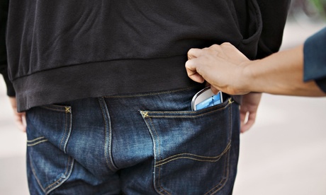 Thief stealing mobile phone 