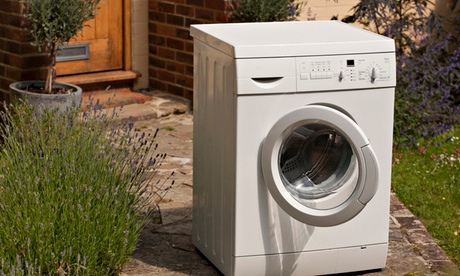 Washing machine ready for collection outside the house