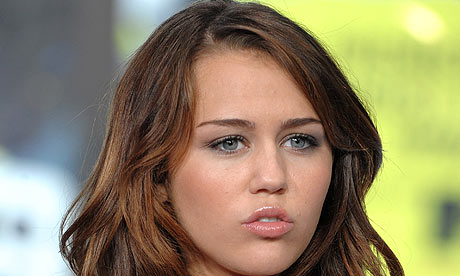 Teenage pop star Miley Cyrus has denied accusations of racism after a 