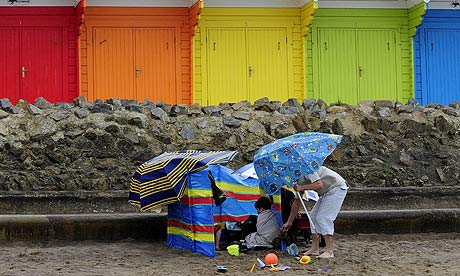 Holiday makers in heavy rain