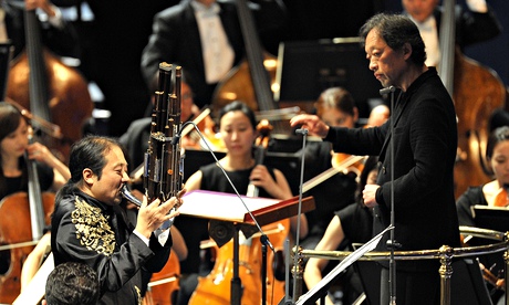 Virtuosity … Wu Wei (left) plays the sheng as Myung-Whun Chung conducts the Seoul Philharmonic Orche