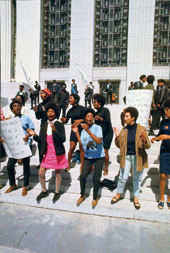 Howard Bingham photos: Female Black Panthers singing in unison at the Alameda County Courthouse