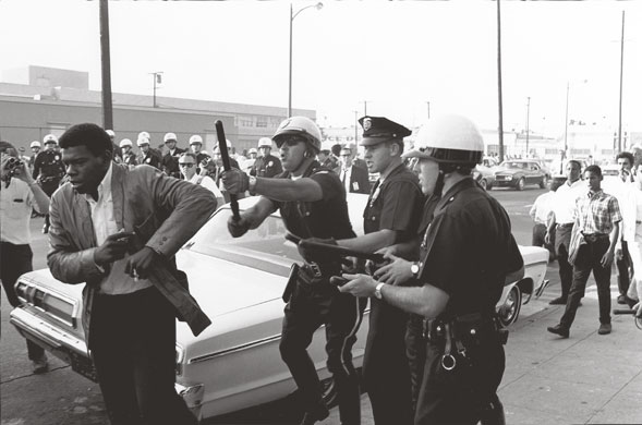 Howard Bingham photos: Police beating a young man in Los Angeles, California