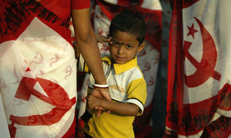 An Indian boy gestures in Kolkata