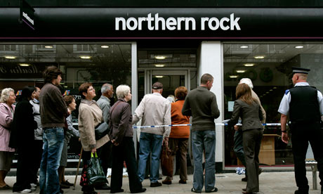 Customers queue to enter a branch of Northern Rock