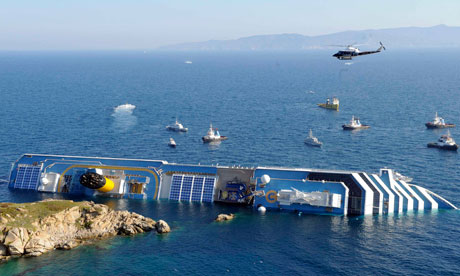 A cruise ship that ran aground is seen off the west coast of Italy at Giglio island