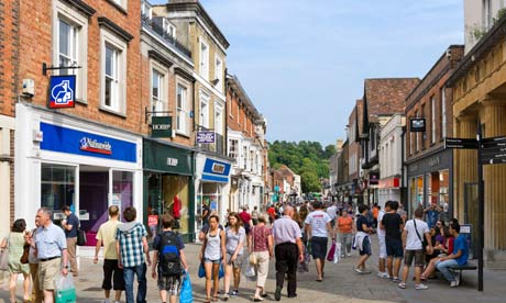 Shops on the High Street in the city centre, Winchester, Hampshire, England, UK