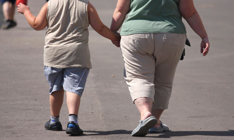 An obese mother and child