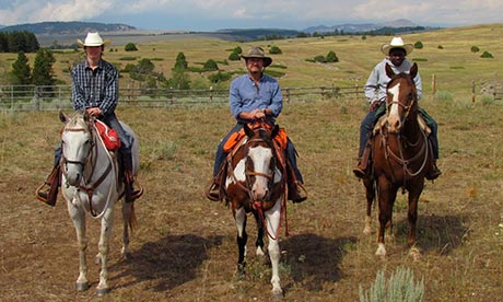 Chris McGreal on horse with sons at ranch Wyoming