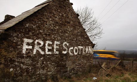 'Free Scotland' painted on cottage wall