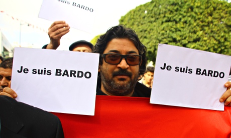 Independence day marchers in Tunis protest against the terrorist attack.