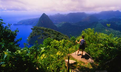 Hiker Admiring View from Peak of Gros Piton Mountain