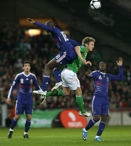 Ireland v France: France's Alou Diarra collides with the Republic of Ireland's Kevin Doyle